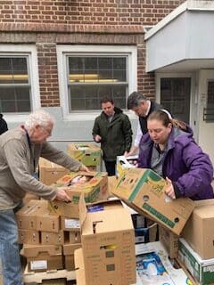 Aramark volunteering at Maize and Blue Cupboard