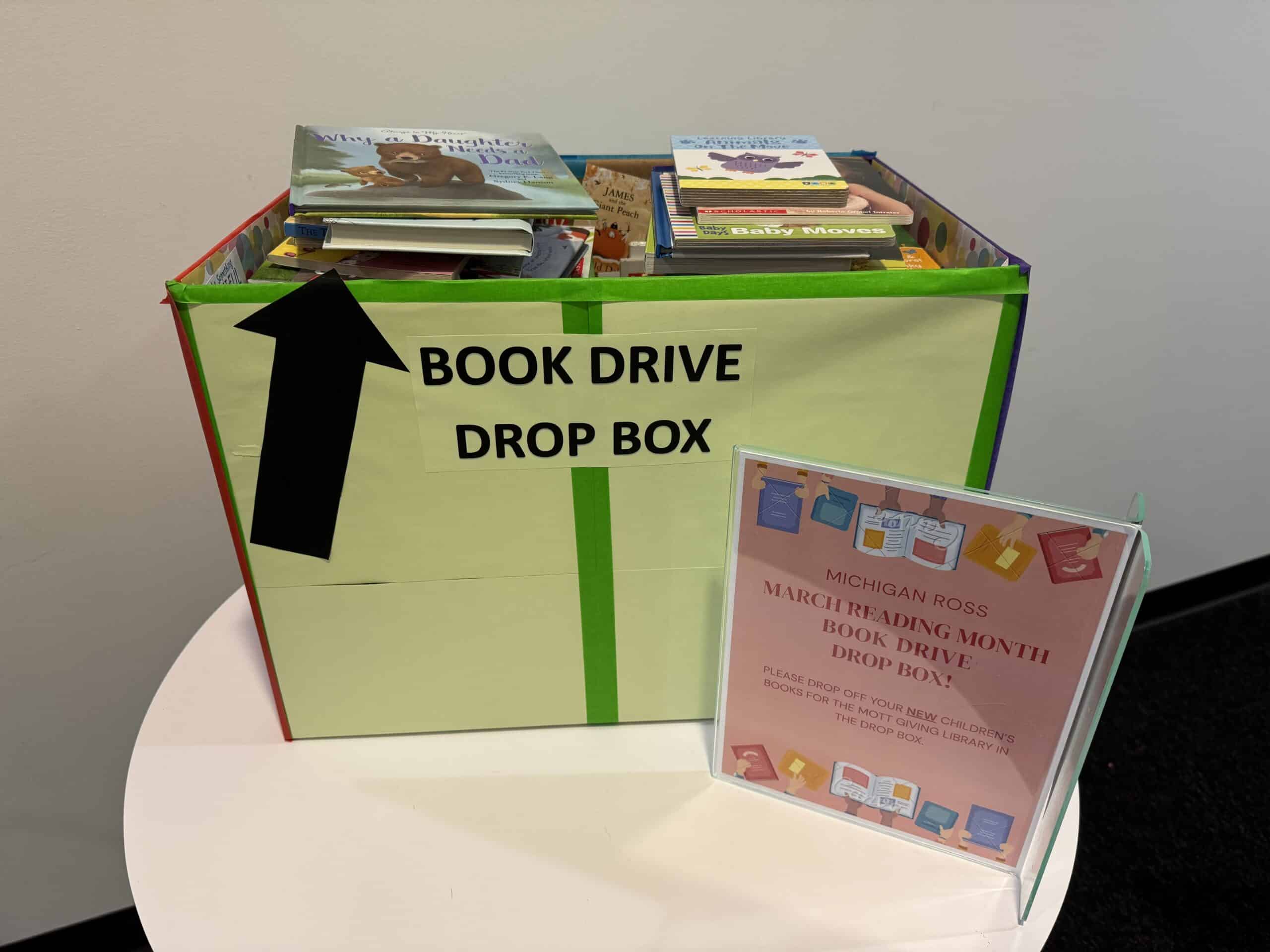 Book drive donation box full of books